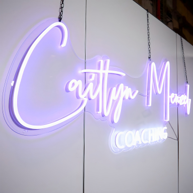 Custom Neon® hanging tradeshow sign for @caitlynmenzelcoaching @hair_festival
