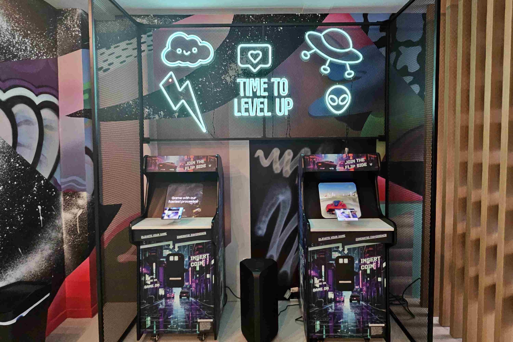 Retro Custom Neon® gaming signs above the video games in the Samsung Flip Side Pop-Ups