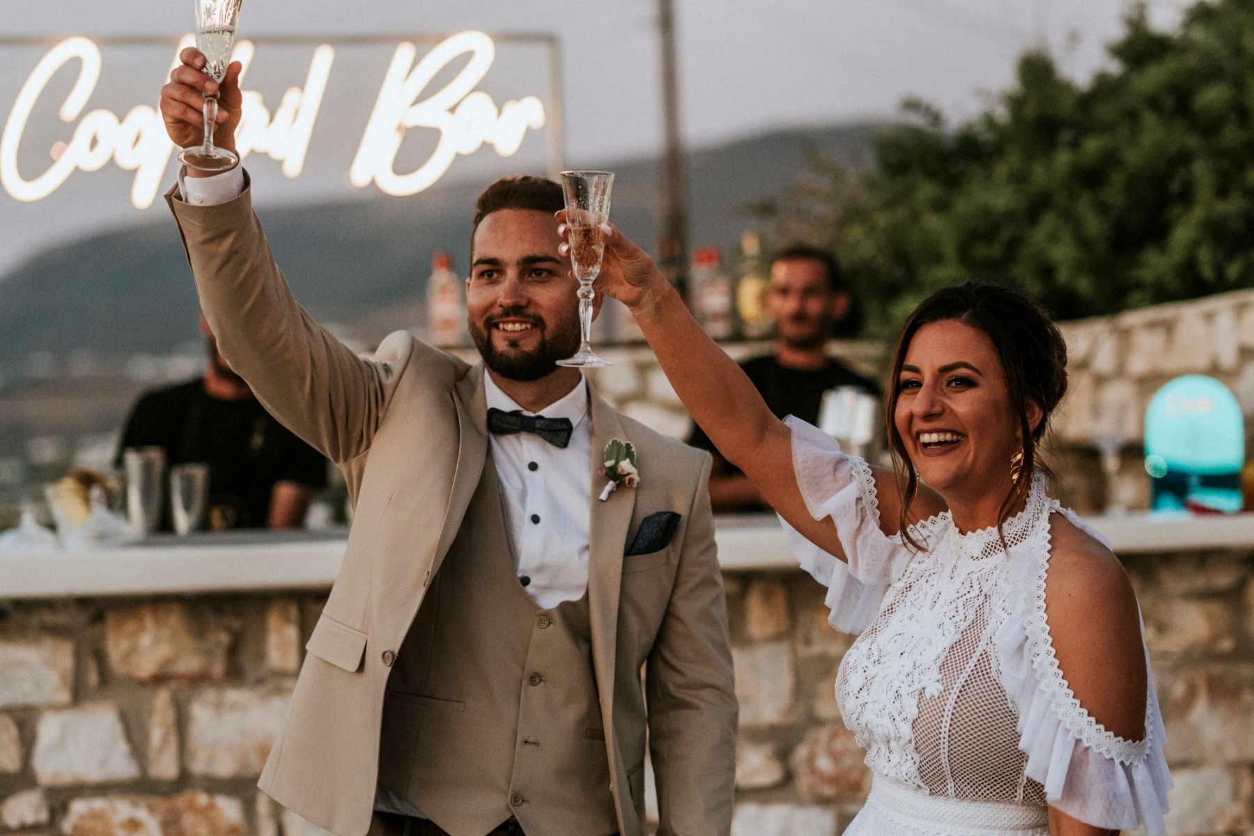 Custom Neon® cocktail bar sign at an outdoor wedding