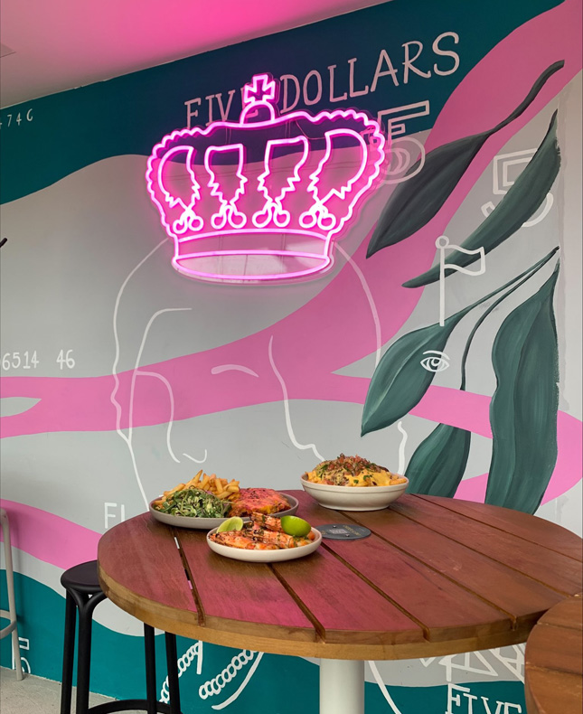 Custom Neon® pink crown installed on mural @vicparkhotel