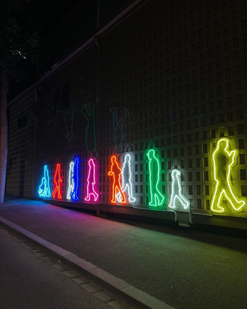 Custom Neon® animated artwork at sidewalk level