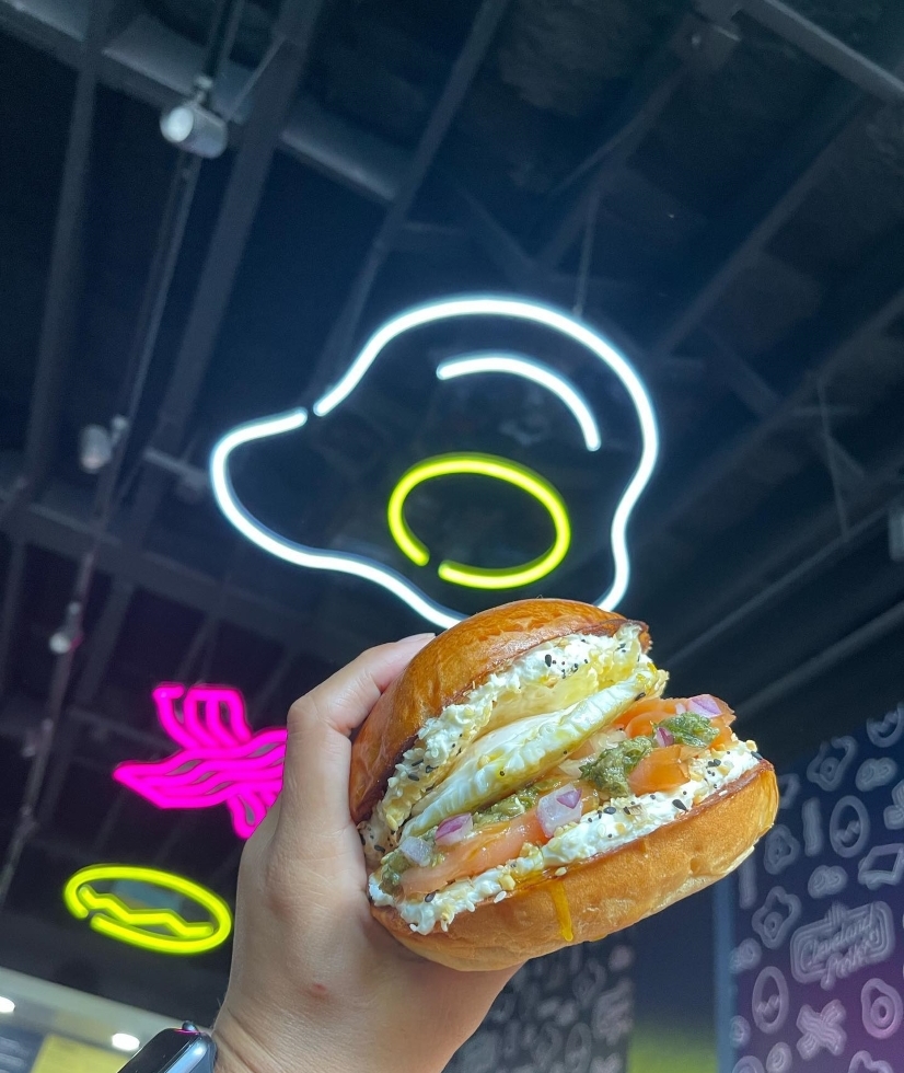 Custom Neon eggs & bacon attached to the ceiling @crackedeggery