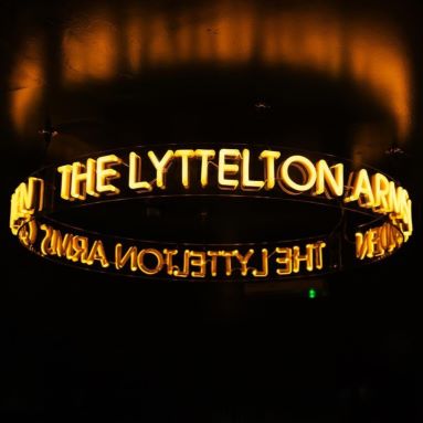 Golden yellow Custom Neon® chandelier sign @lytteltonarms