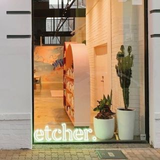 Mint green logo light sign @etchersalon made by Custom Neon®