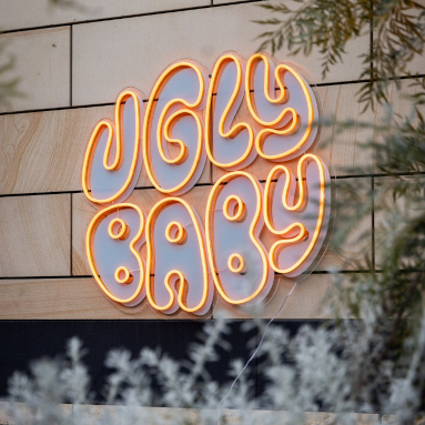 Custom Neon® waterproof exterior restaurant sign @uglybaby @stories.au