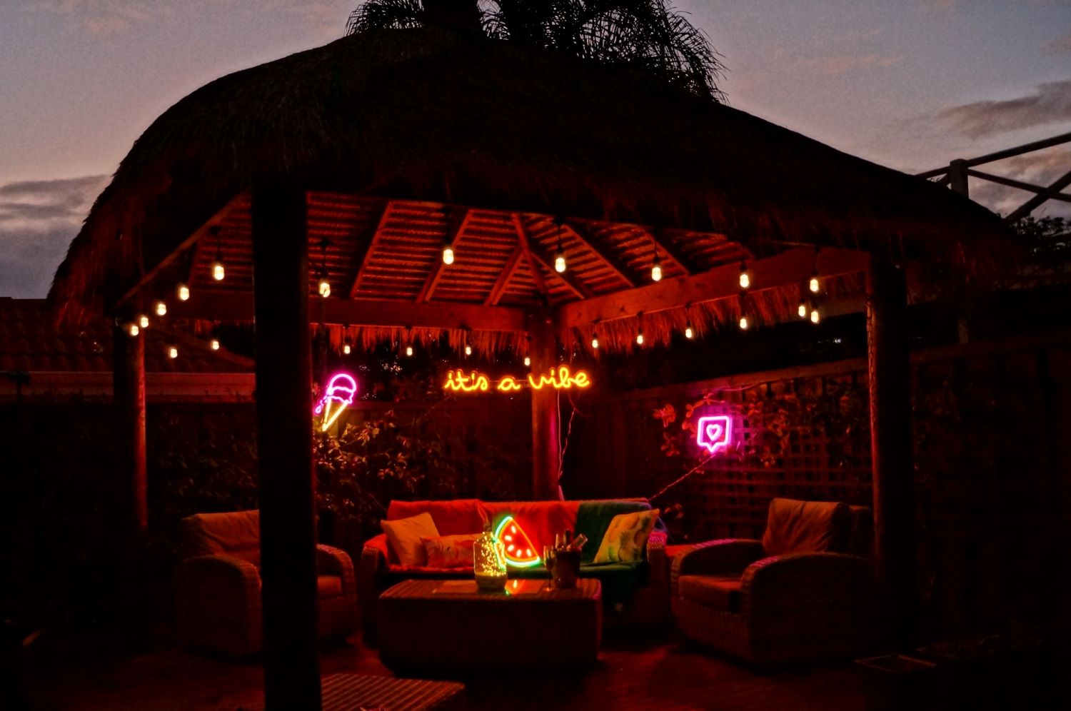 Bali hut decorated with Love Island Australia xCustom Neon® signs