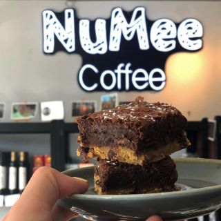 White logo light on black acrylic @numeecoffee by Custom Neon®
