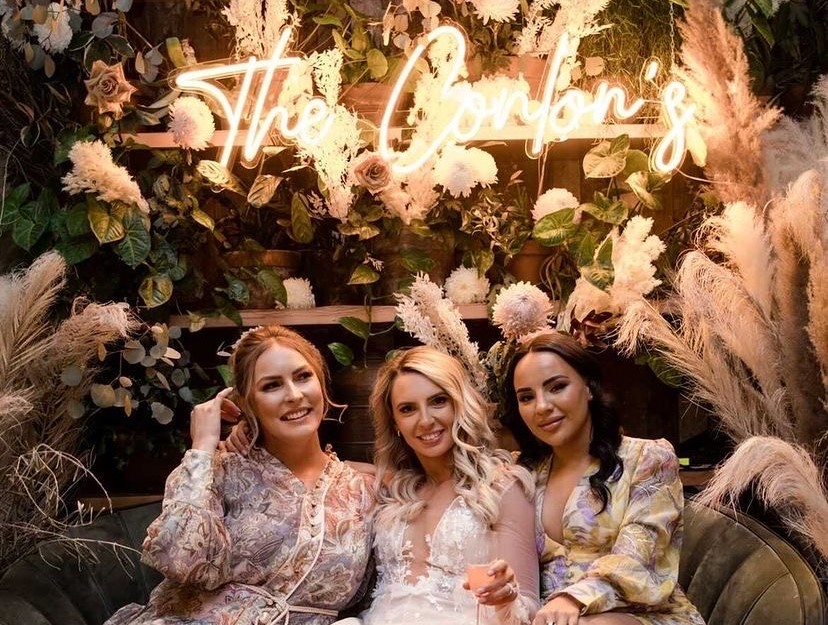 Orange Custom Neon® wedding last name sign