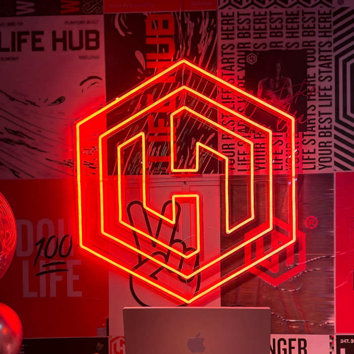 Red Custom Neon® geometric logo made for @lifehubgeelong