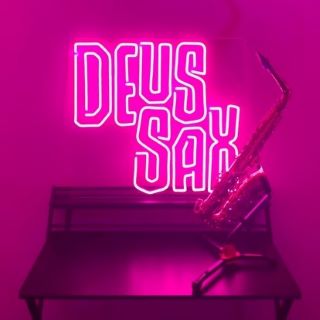 Custom Neon® pink music duo logo @deus_sax