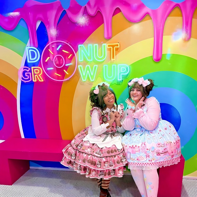 Donut Grow Up Custom Neon® sign on the rainbow colored Insta wall @sundaedonuts photo@snazzytazzes