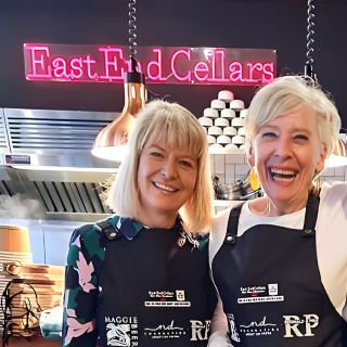 @eastendcellars red Custom Neon® sign behind @maggie_beer