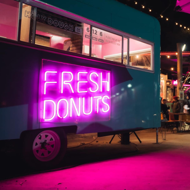 Pink Custom Neon® outdoor bakery sign @bobbybakehousedural