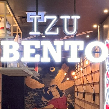 Izo Bento Japanese take out logo sign in 3D acrlic lettering on the restaurant window