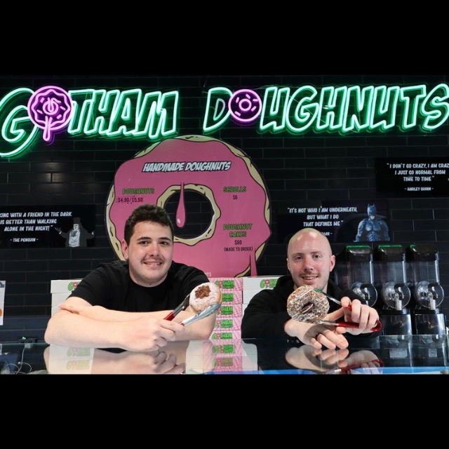 Pink and green Custom Neon® bakery logo sign @gotham.doughnuts
