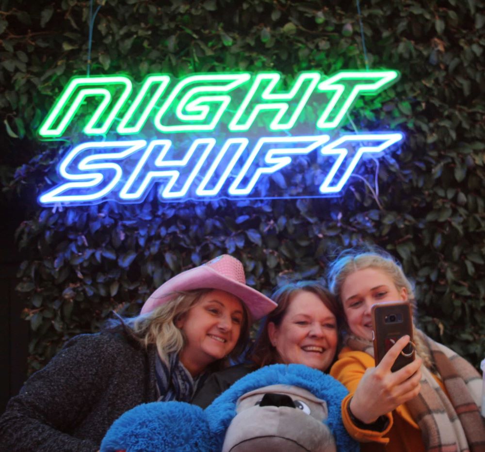 Green & blue Custom Neon® event sign