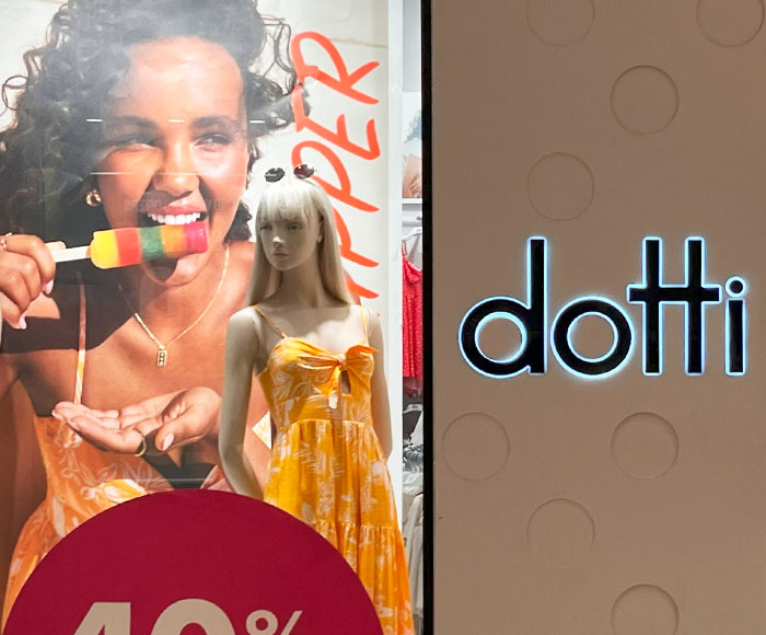 Black store name sign back lit with white LED