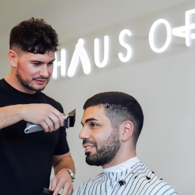 Haus of Trims white Custom Neon® company name sign @hauseoftrims