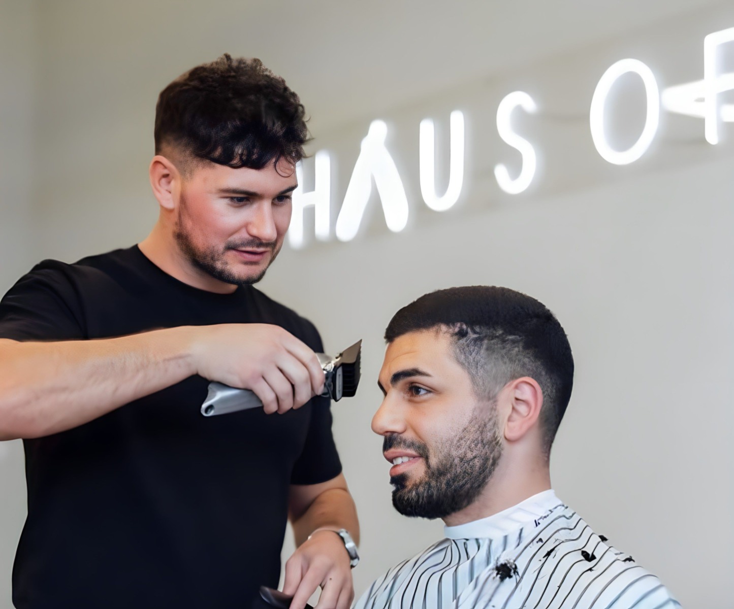 Haus of Trims white Custom Neon® company name sign @hauseoftrims