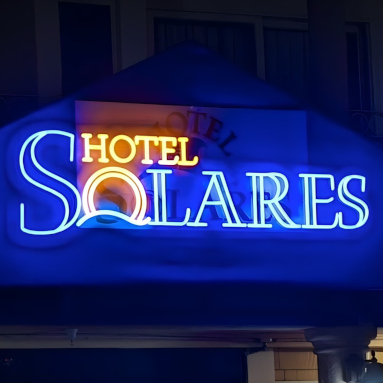 Custom Neon® hotel logo sign installed on the roof @hotel_solares
