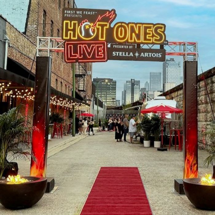 Hot Ones Live waterproof Custom Neon® signs at the entrance to the Hot Ones Live event in Chicago IL organised by @thesuperproducers @emdahlquist