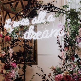 Custom Neon® white wedding sign on metal arch