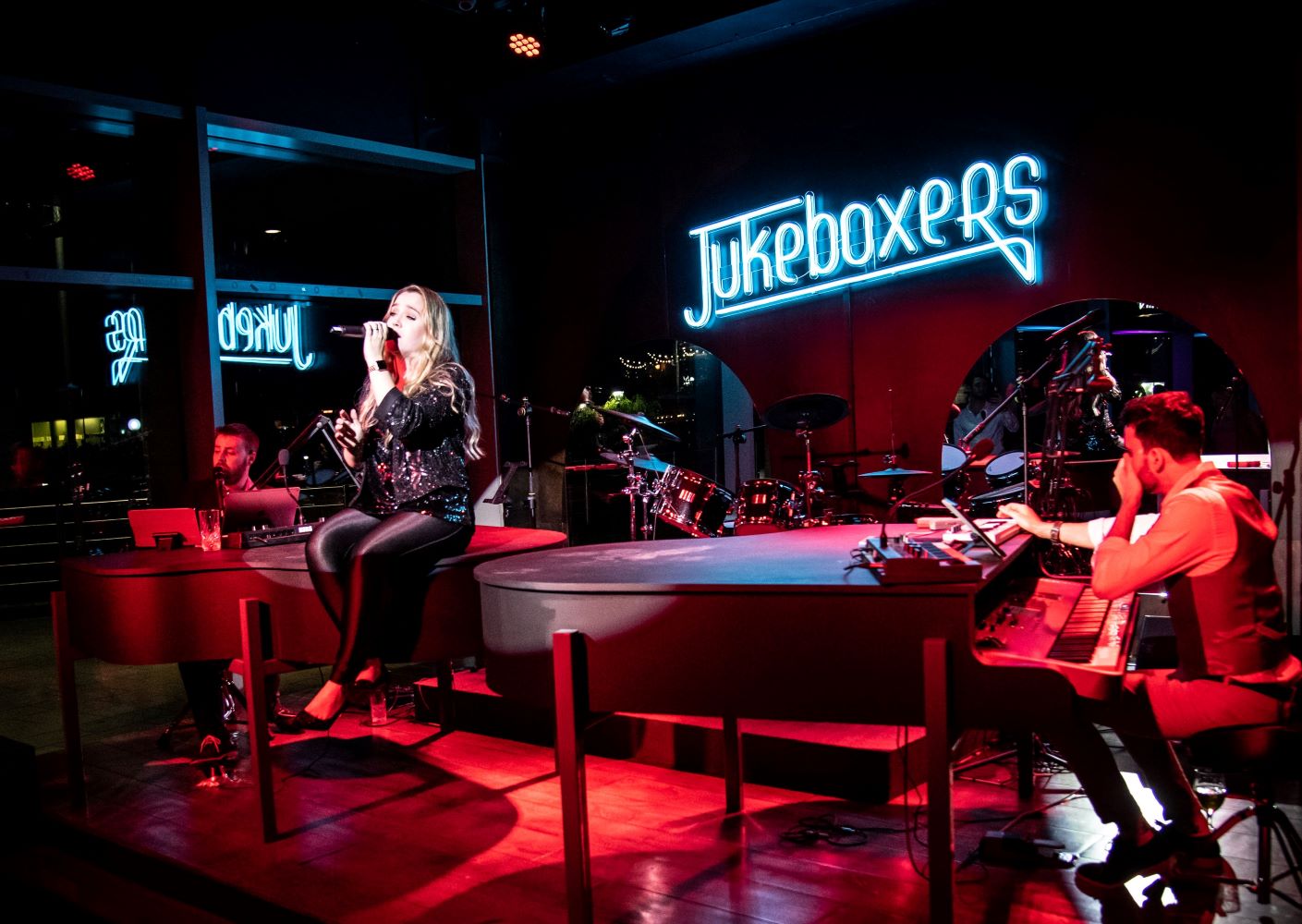 Blue Custom Neon® logo @jukeboxersbar