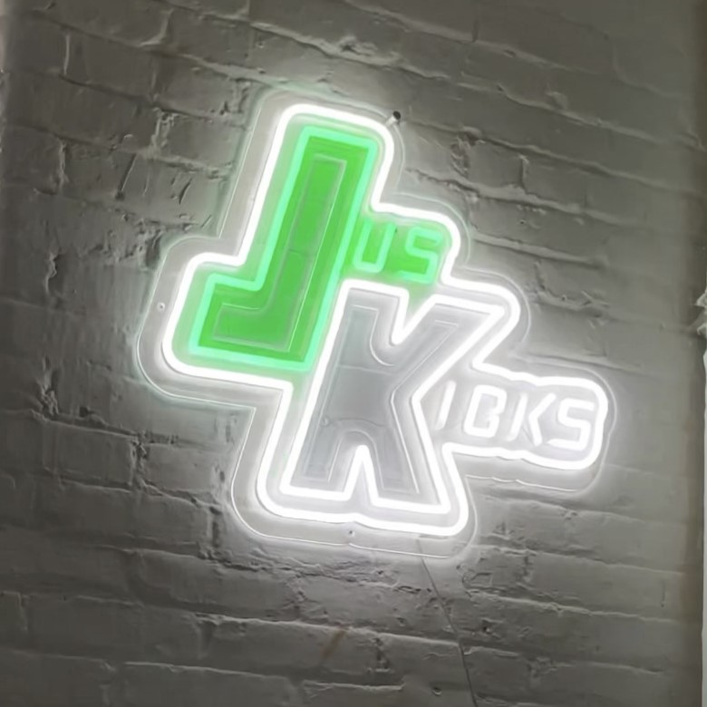 Custom Neon® florist  on brick wall @artsfloral