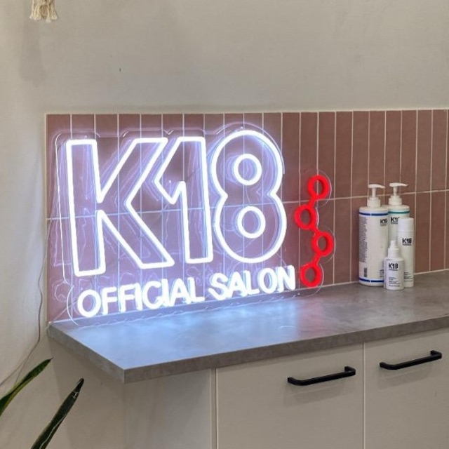 White and red Custom Neon® logo sign for a hair salon @k18hair_australia