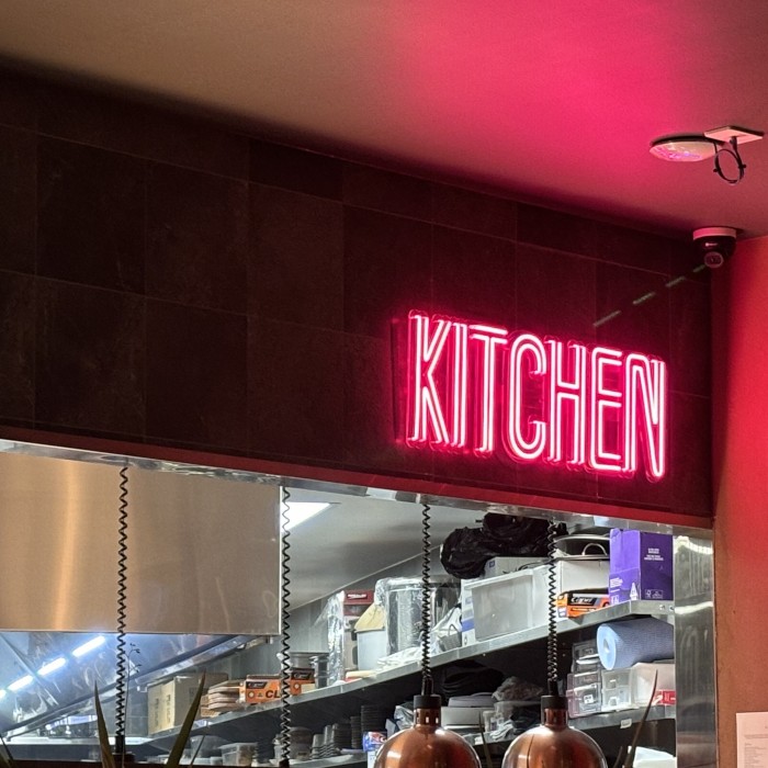 Kitchen double lined Custom Neon® wayfinding sign with arrows @stories.au