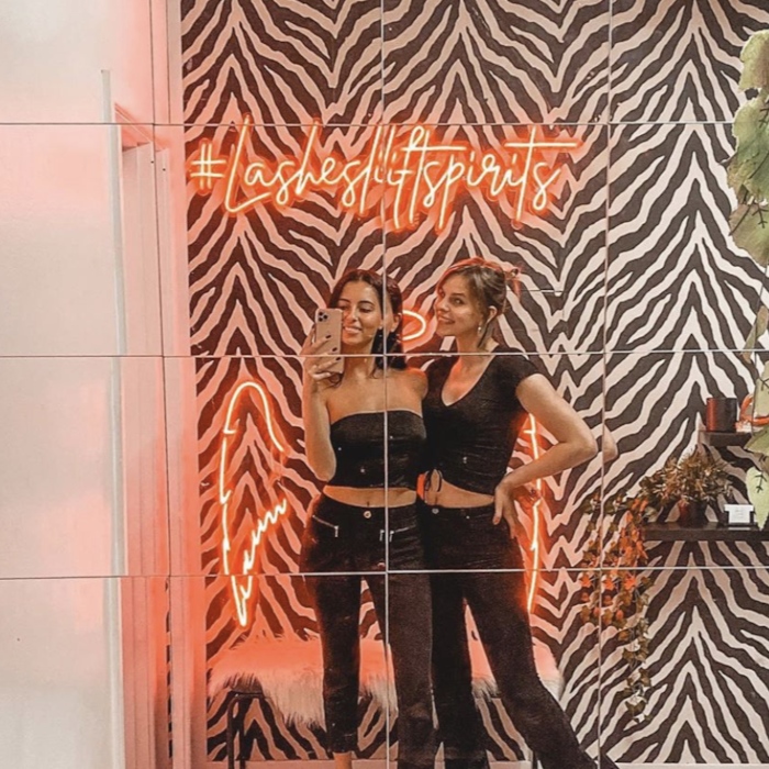 Lashes Lift Spirits red Custom Neon® hashtag selfie sign on mirrored wall @reallashclub