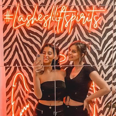 Lashes Lift Spirits red Custom Neon® hashtag selfie sign on mirrored wall @reallashclub
