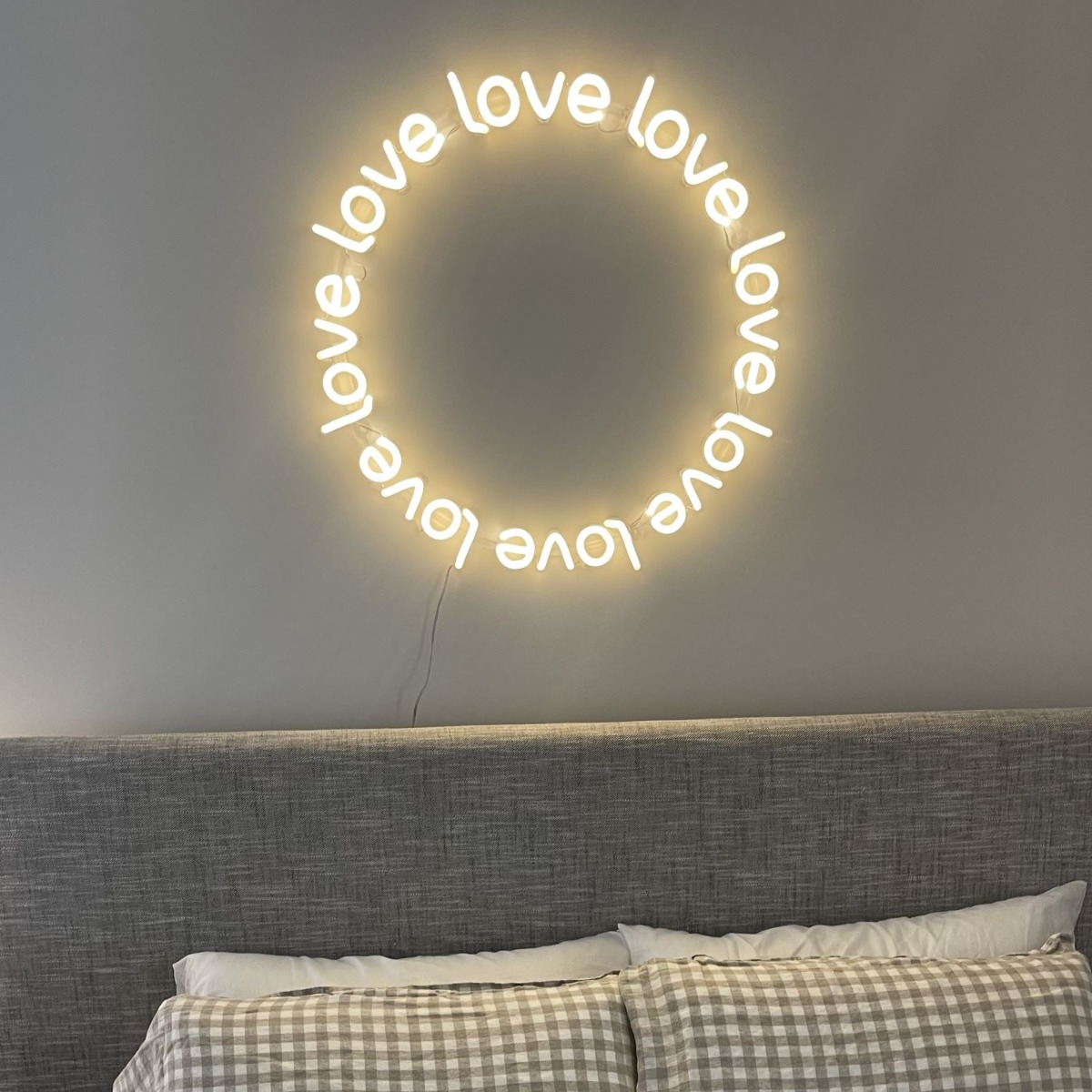 Warm white Naked Neon™ bedroom wall sign by Custom Neon®