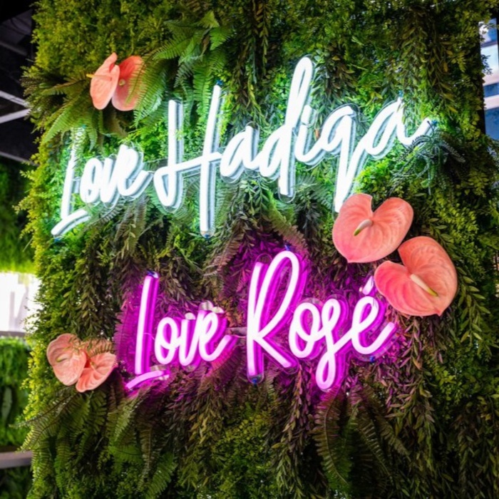 Custom Neon® restaurant word sign on a grass wall @hadiqaperth