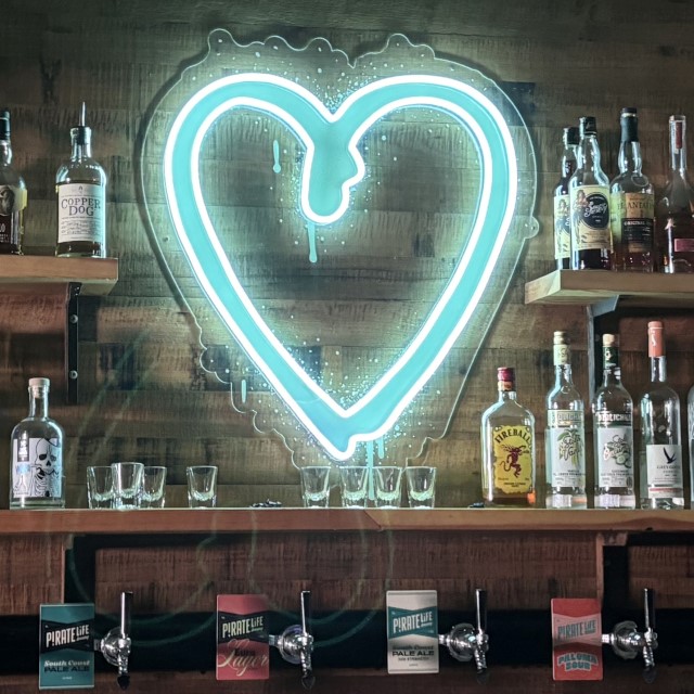 Custom Neon® mint blue dripping love heart with UV printed backboard @crushperth restaurant