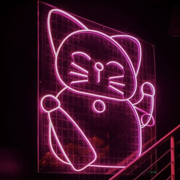 Custom Neon® pink animated Lucky Cat on a rectangular backboard