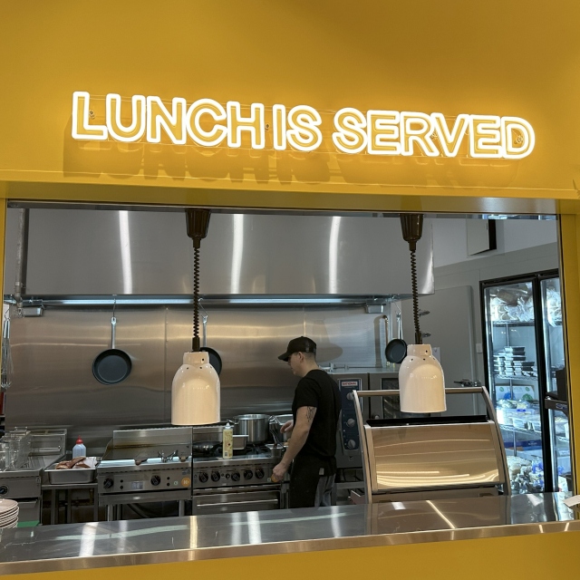 Warm white Custom Neon® lunch is served cafe sign @thelittlespoonco