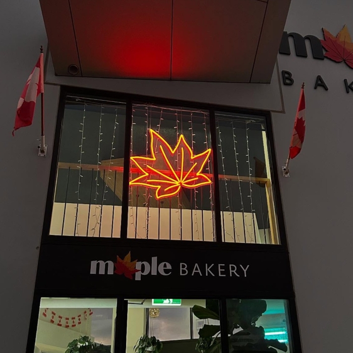 Custom Neon® bakery window wall art @maplebakerysurfcoast
