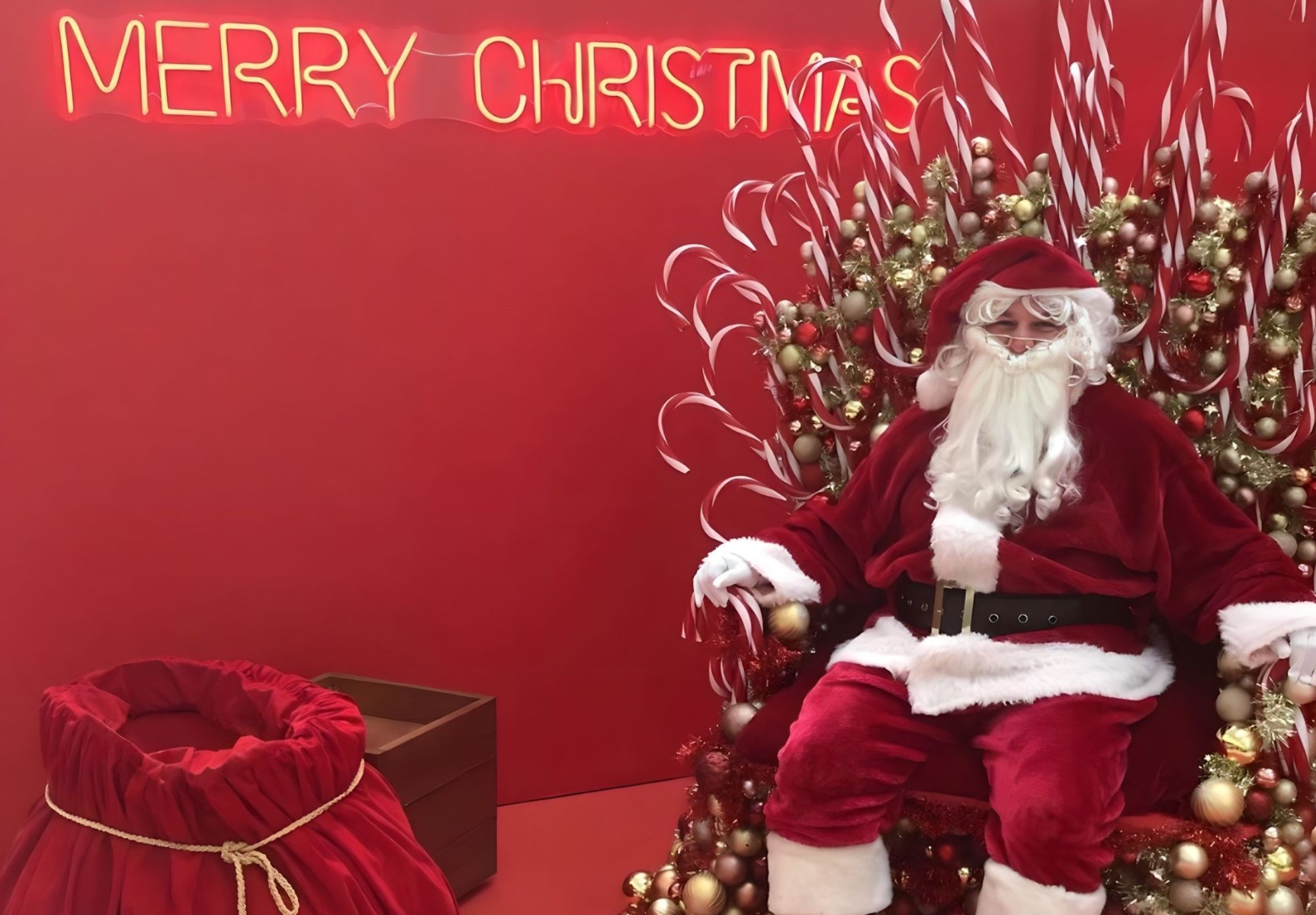 Custom Neon® red Merry Christmas light sign as part of Santas Grotto at @rhodeswaterside shopping mall