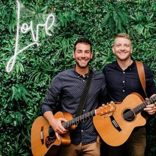 Custom Neon® sign on greenwall @mitchandjacksonmusic