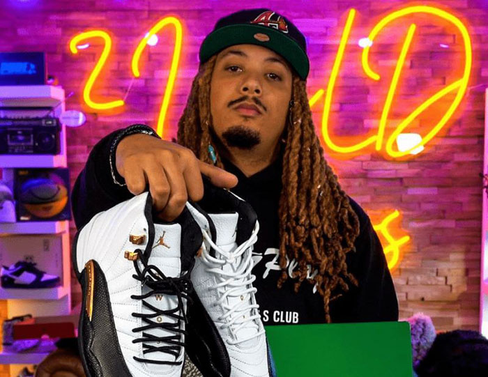 Large orange Custom Neon® content creator personalised backdrop sign