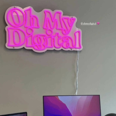 Pink and white logo sign by Custom Neon® made for the offices of @ohmydigitalagency