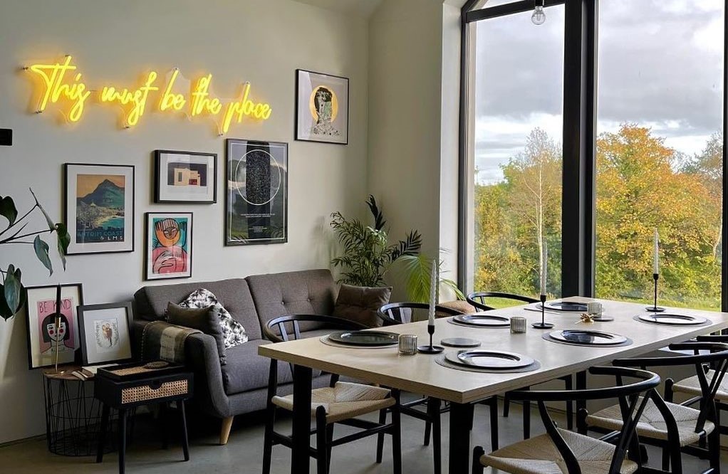 Dark yellow Custom Neon® sign in living/dining room @our_build_our_journey