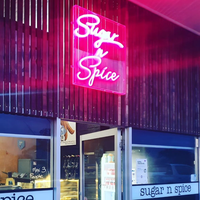 Custom Neon® shopfront bakery sign @bridportsugarnspicebakery