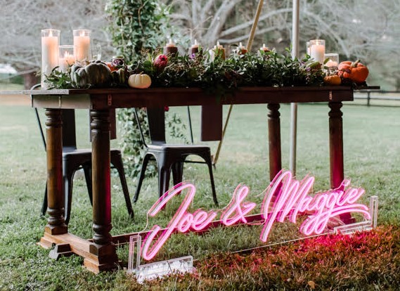 Pink outside wedding name sign @marlayna_photography by Custom Neon®