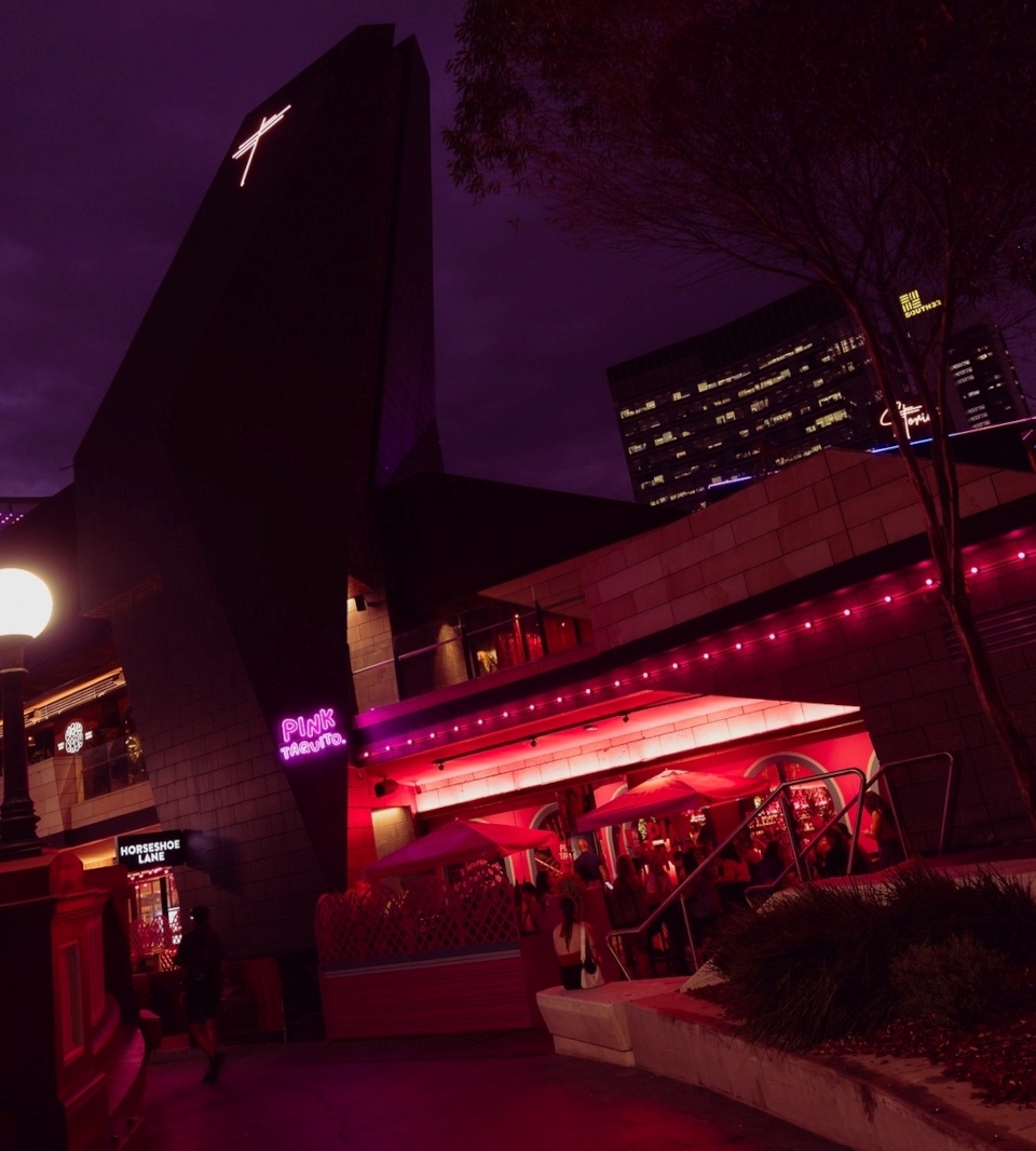 Waterproof Custom Neon® building sign at the entrance to the @pinktaquito_ Mexican pop up @stories.au