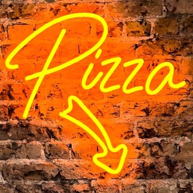 Custom Neon® orange PIZZA arrow sign on brick wall @bridgebaker