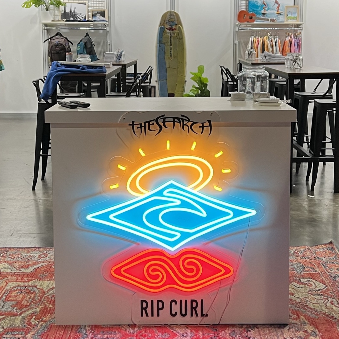 Rip Curl The Search Custom Neon® sign in Rip Curl's SurfExpo display booth