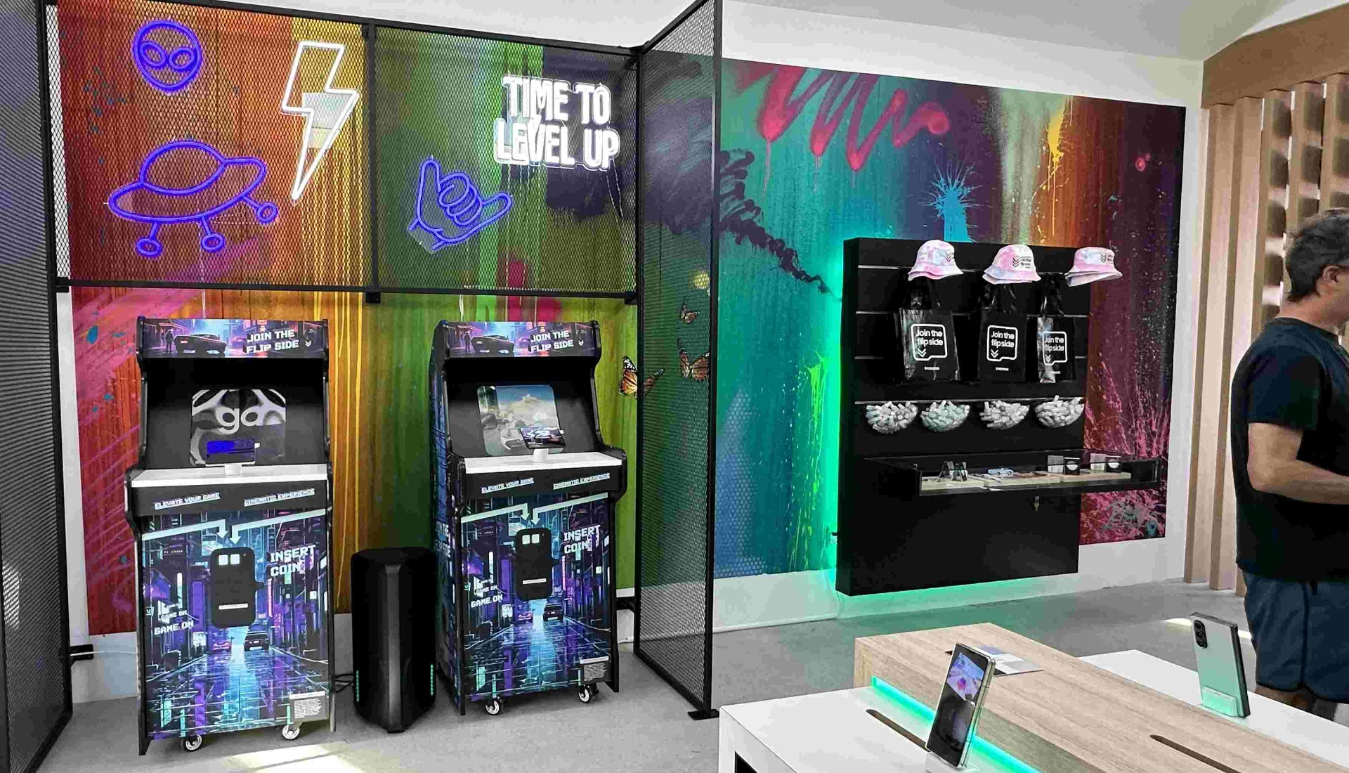 Retro Custom Neon® gaming signs above the video games in the Samsung Flip Side Pop-Ups