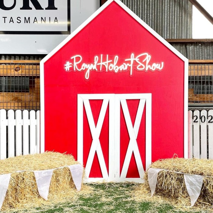 Custom Neon® sign for the Royal Hobart Show on a red and white barn @hobartshowgrounds